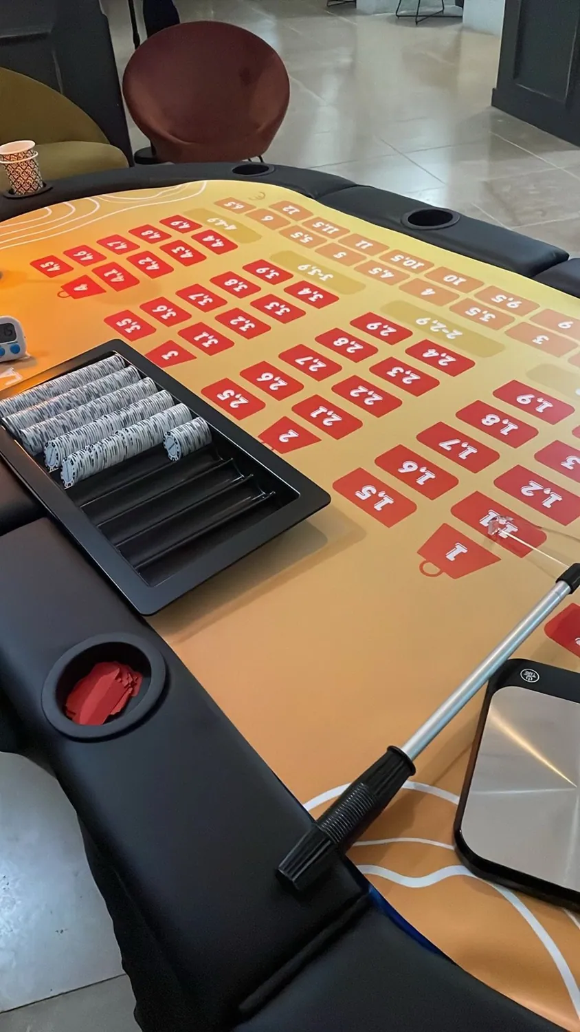 Détail du tapis lumineux et des jetons